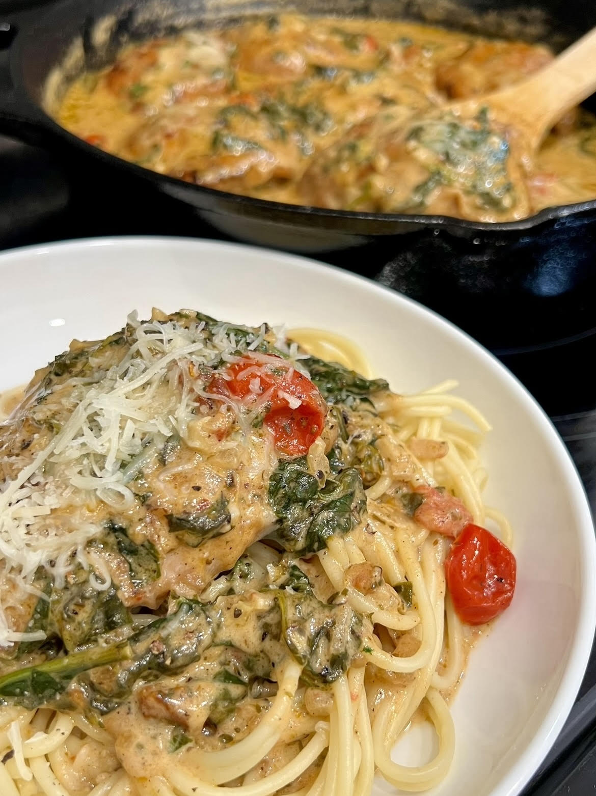 Creamy Tuscan Chicken Over Spaghetti